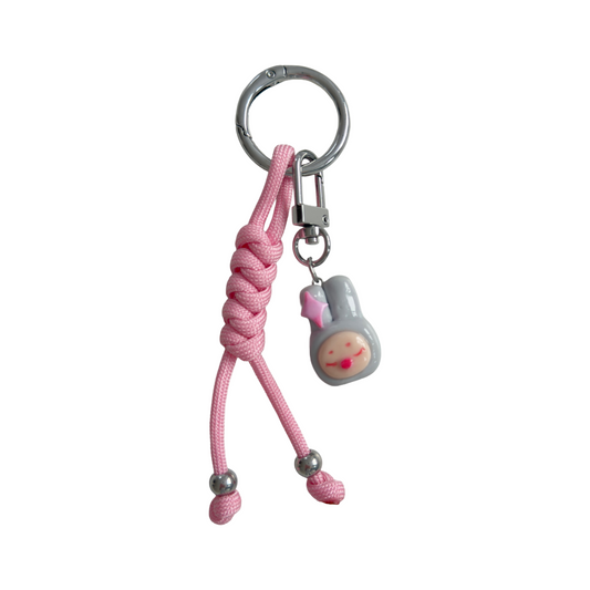 Handmade paracord, clay and stainless steel keychain.